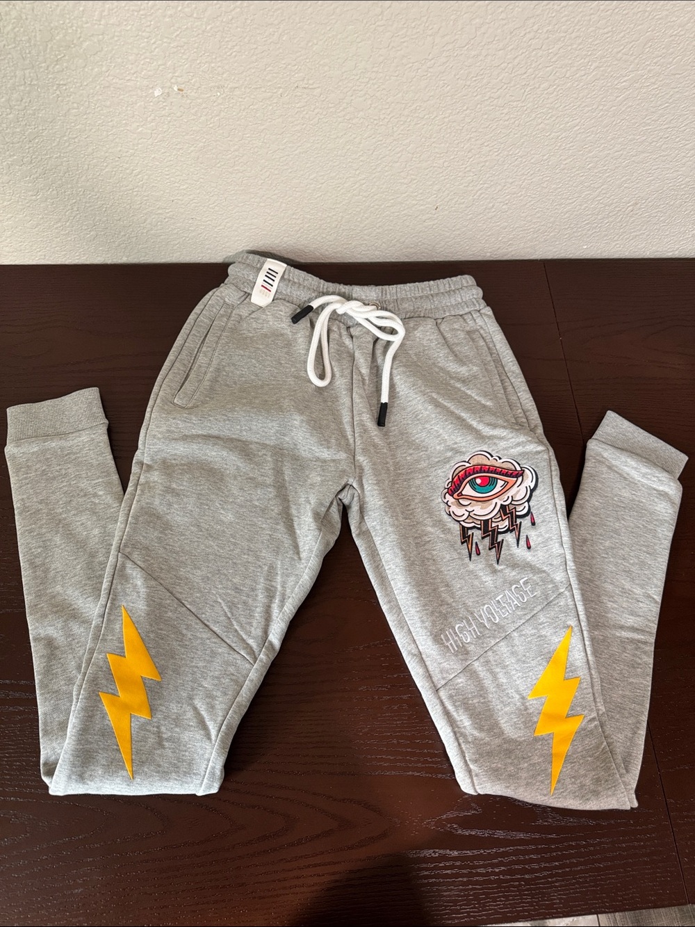 Fifth Loop Gray Joggers with Yellow Lightning and Multicolor Eye Patch
